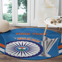 Blue round cricket carpet rug with India emblem and blue/orange side stripes