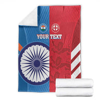 Blue, red, and white cricket blanket with India and England flag halves and circular emblem