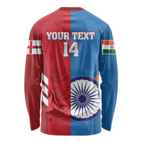 Long-sleeve cricket shirt with red/blue panels, flags, and number 14