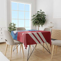 Blue and red cricket tablecloth with flag-style graphics on a dining table