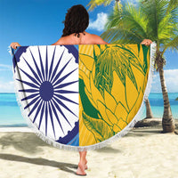 Round beach blanket held outdoors, fringed edge, India and South Africa split with tropical print