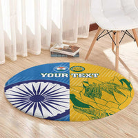 Round blue-and-yellow cricket carpet showing custom text across two halves
