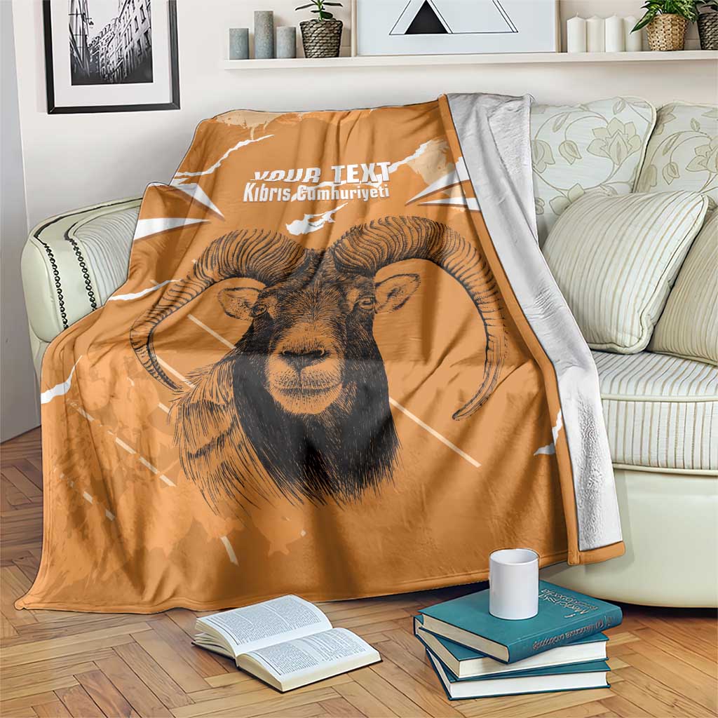 Orange personalized throw blanket with ram face graphic and white rays, YOUR TEXT above