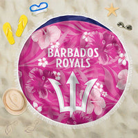 Round pink Barbados Royals beach blanket with fringe, floral print and “17” logo