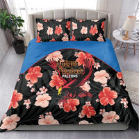 Cricket bedding set on bed: black floral duvet, blue side panels, Falcons bird logo