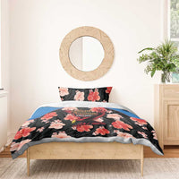 Black floral duvet and pillow set with red and pink blossoms, blue trim, Falcons emblem