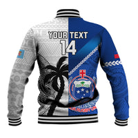 Blue, gray and black rugby baseball jacket with number 14 and tapa graphic on back