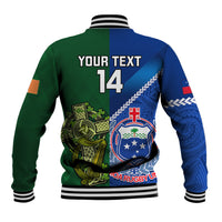 Rugby baseball jacket back view, green and blue with crest graphic and striped cuffs