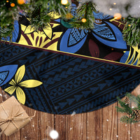 Blue tree skirt fabric with zigzag bands and yellow frangipani flowers, white fringe edge