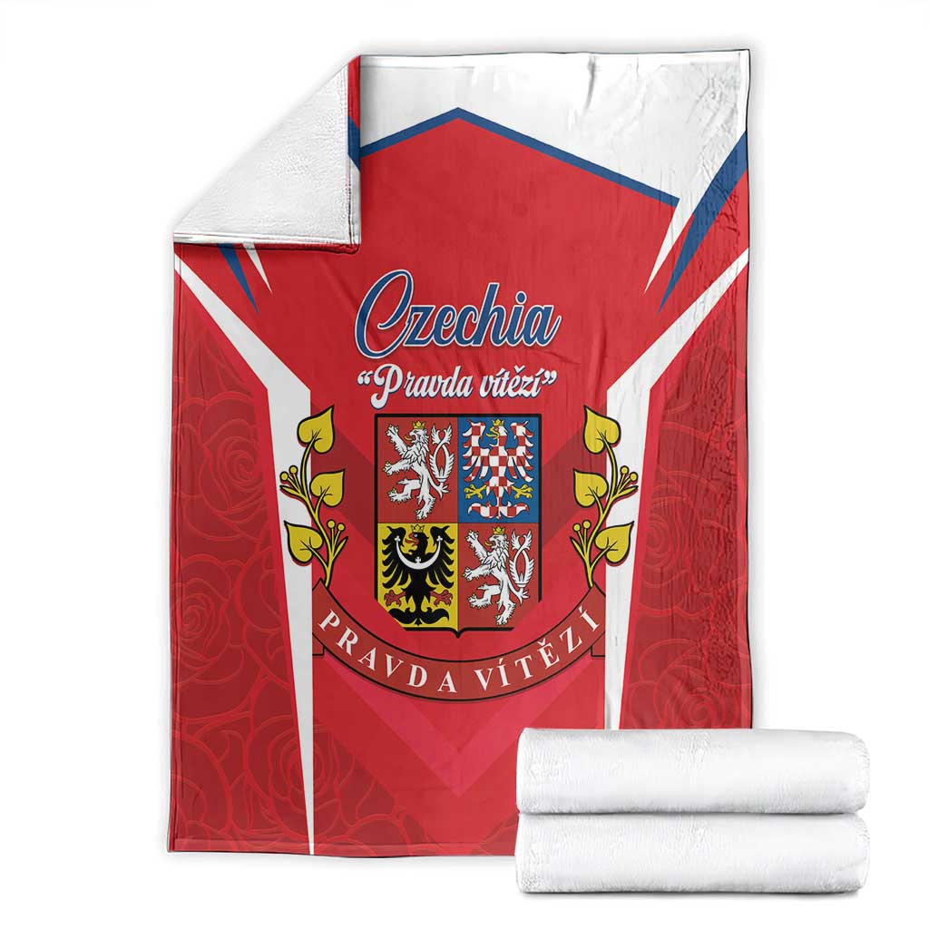 Folded red and white Czech crest blanket with blue trim and shield emblem