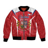 Red bomber jacket with white-and-blue stripe, central crest graphic, zip front.