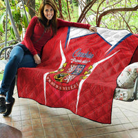Red quilt with Czechia crest design and white-blue chevron stripes, quilted diamond texture