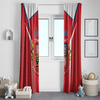 Red Czech flag curtain panels with blue diagonal stripes and crest, hanging side-by-side