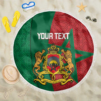 Round beach blanket with fringed edge, green and red Moroccan crest pattern