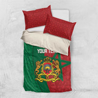 Moroccan bedding set with red patterned pillowcases and green-red duvet with crest graphic