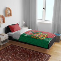 Moroccan bedding set with green and red patterned duvet cover and two red pillows