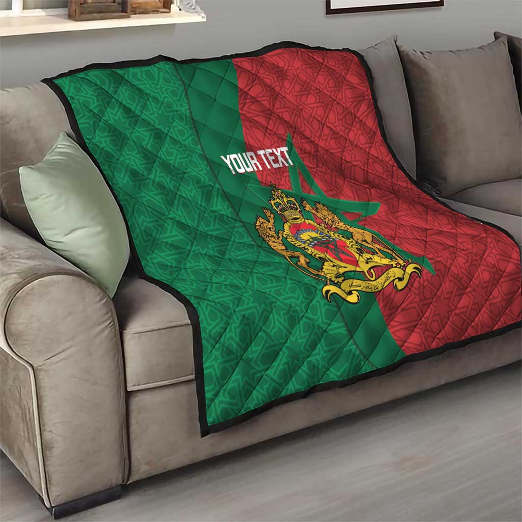 Personalised Morocco quilt on sofa: green and red star panels with quilted pattern and crest