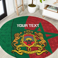 Personalized round Moroccan rug in green and red with gold crest and star pattern