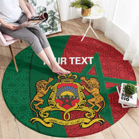 Round Moroccan area rug, green and red with gold crest emblem and geometric star motif