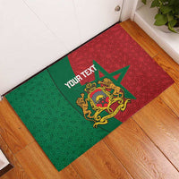 Personalised rubber doormat with green and red Moroccan geometric pattern and crest