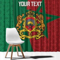 Close-up of Moroccan window curtain with green and red star pattern and ornate crest, custom text