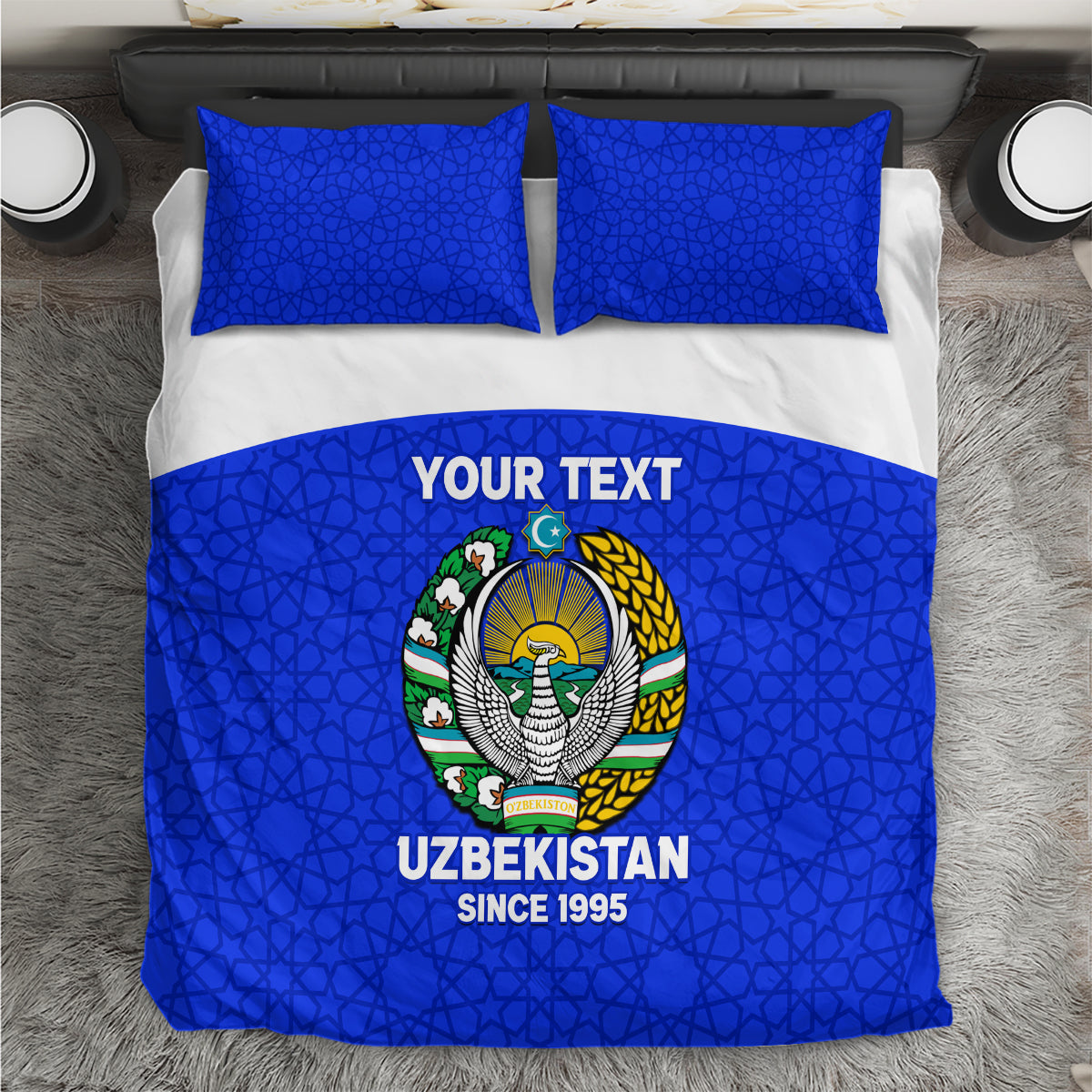 Blue Uzbekistan bedding set with patterned crest, YOUR TEXT panel, and two pillowcases.