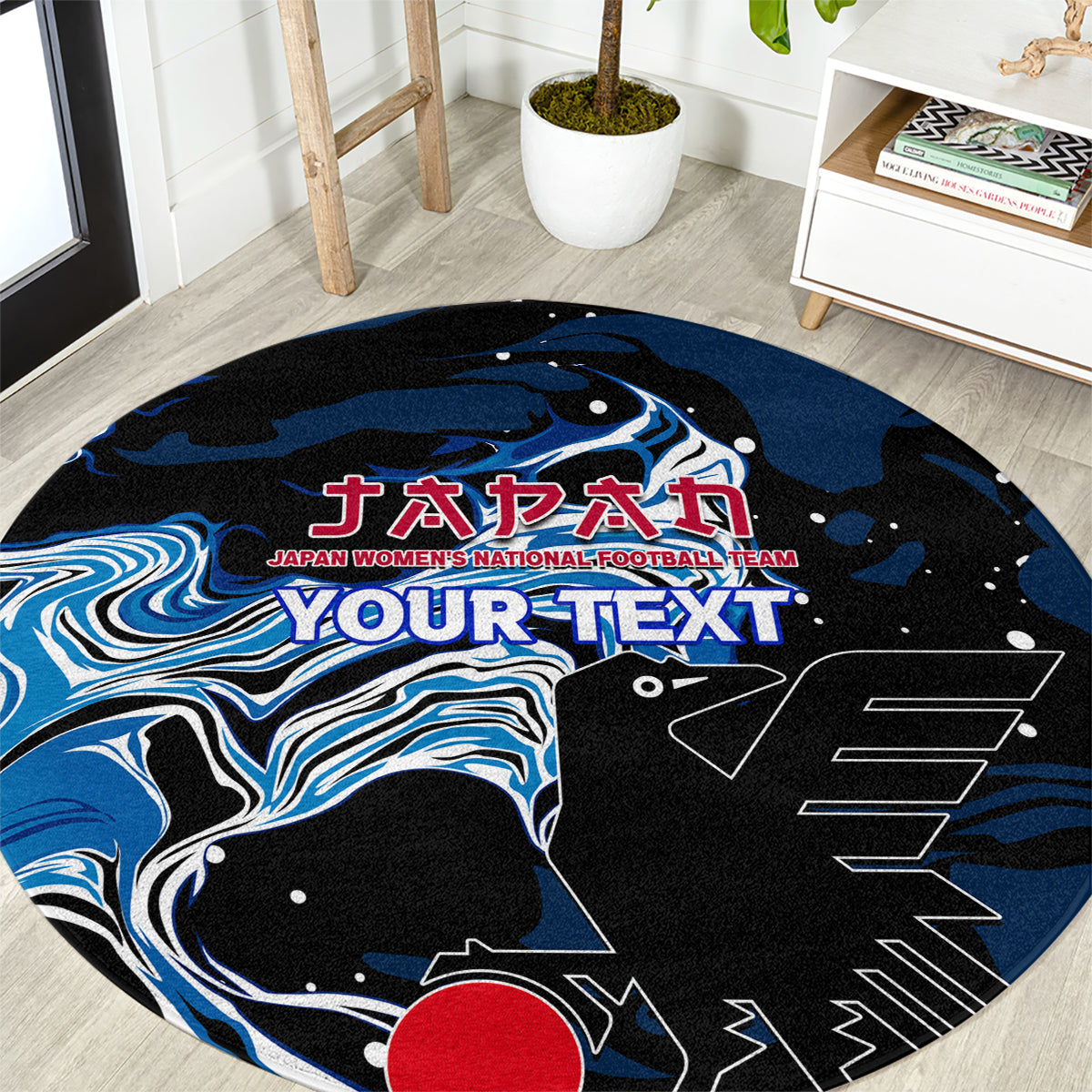 Black round area rug with blue graphic football design and Japanese text, red accent center