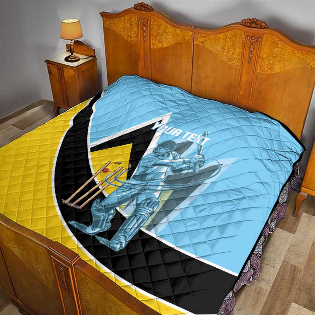 Light blue cricket quilt folded on bed with yellow-and-black V stripe and player graphic.