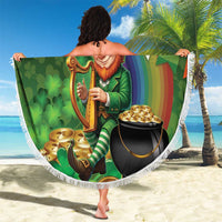 Round green beach blanket showing leprechaun with harp and coins pot, white fringe edge