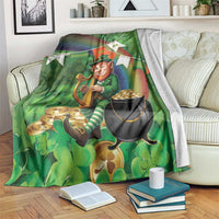 St. Patrick's Day green throw blanket with leprechaun holding a harp and gold cauldron
