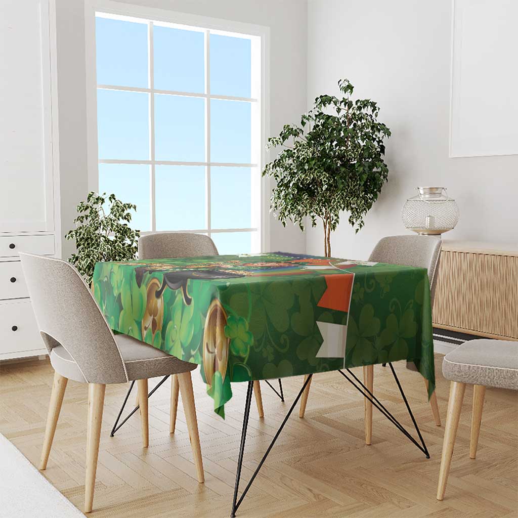 Green shamrock tablecloth with leprechaun and Irish harp pattern draped on table