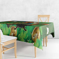 Green shamrock tablecloth corner detail with leprechaun and Irish harp motifs