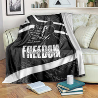 Black Mandela throw blanket with white stripes, portrait and South Africa Freedom text on sofa