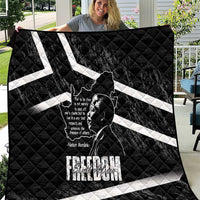 Black quilt with white diagonal stripes, map outline, and Mandela portrait graphic