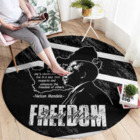 Black round area rug with Mandela portrait, map outline, and Free South Africa lettering