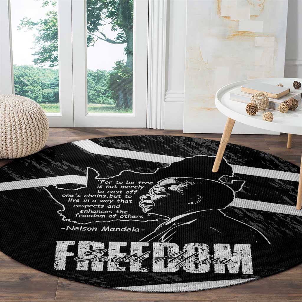 Black round area rug with Mandela portrait, map outline stripe, and Free South Africa text