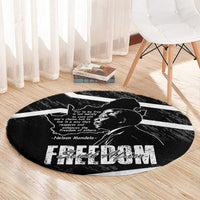 Black round area rug with Mandela portrait and Free South Africa lettering centerpiece