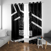 Black window curtain with white diagonal stripes and Mandela quote print on two panels