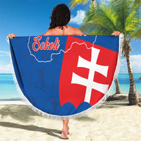 Round blue beach blanket with Slovakia flag design, Sokoli text, and fringe trim