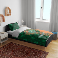 Green and orange duvet cover on bed with Irish cricket crest, celtic cross design, and custom text