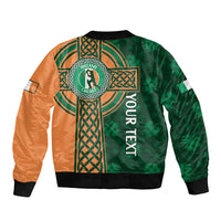 Green and orange bomber jacket with Celtic crest, knot panel, and 'YOUR NEXT' text