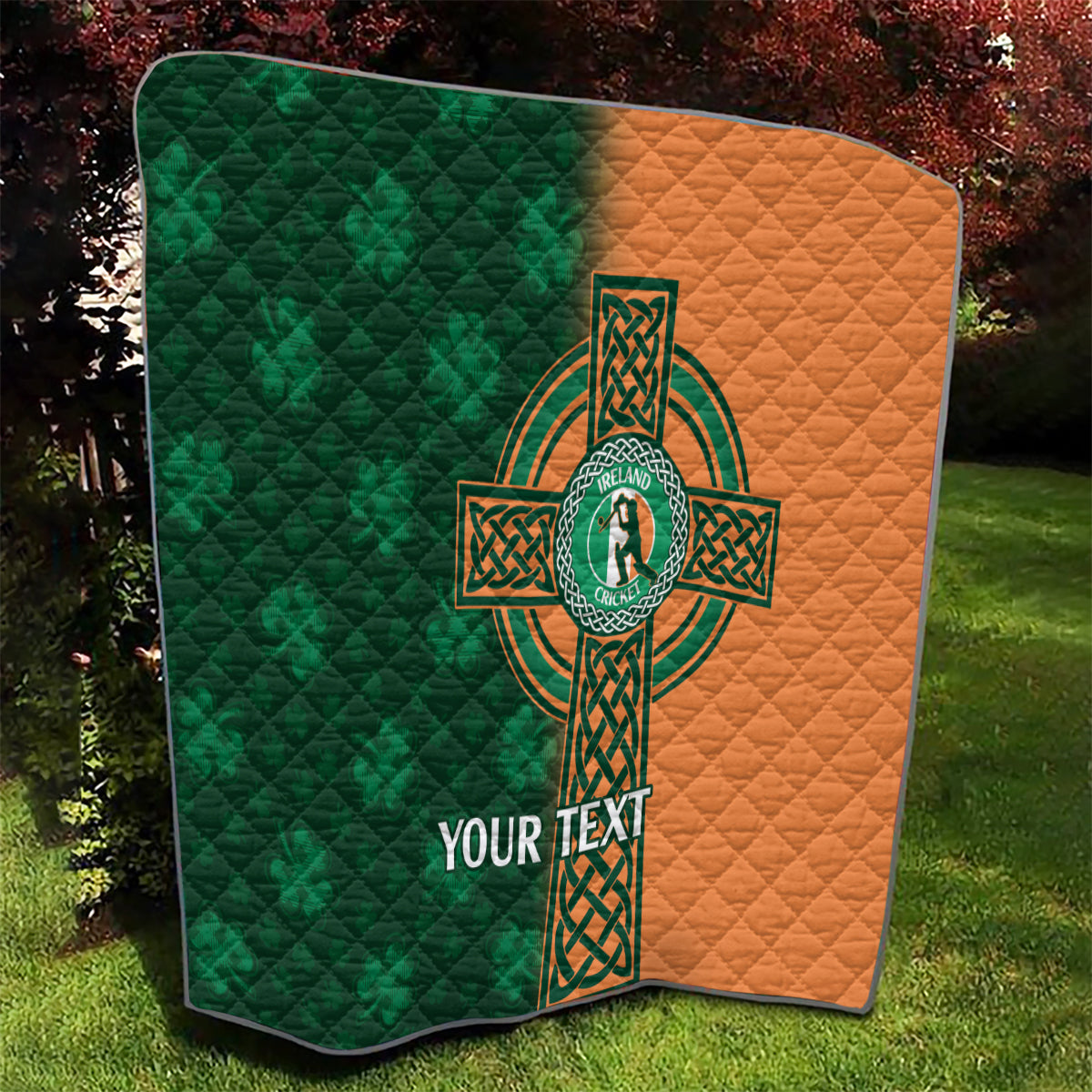 Green and orange quilt with Celtic cross shamrock emblem and 'YOUR TEXT' shown corner view