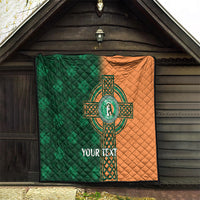 Custom cricket quilt hanging indoors: green and orange halves with Celtic cross shamrock logo