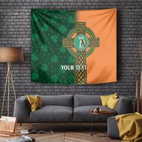 Green and orange Ireland cricket tapestry with Celtic cross emblem and YOUR TEXT on brick wall.