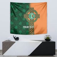 Green and orange Ireland cricket tapestry with Celtic cross emblem and YOUR TEXT on wall above console.