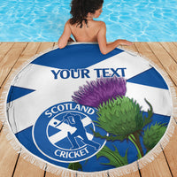 Round beach blanket with blue/white stripes, Scotland Cricket emblem, fringe