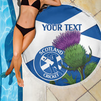 Round beach blanket with blue/white Scotland Cricket logo, purple thistle, fringe