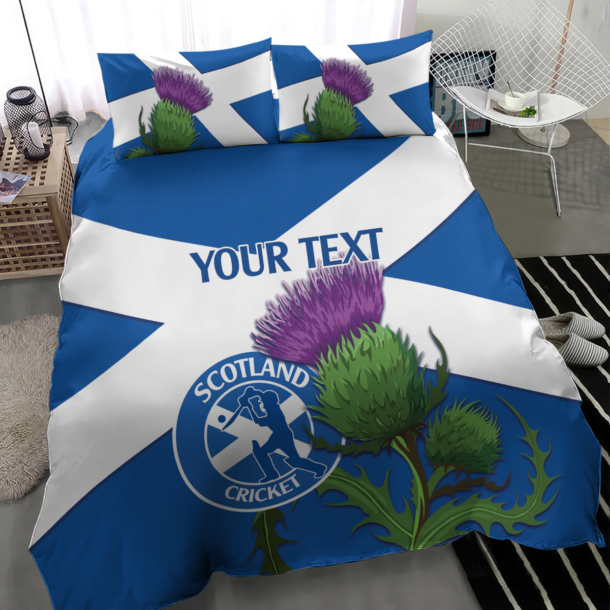 Blue and white Scotland cricket bedding set with custom text, thistle flowers, and logo