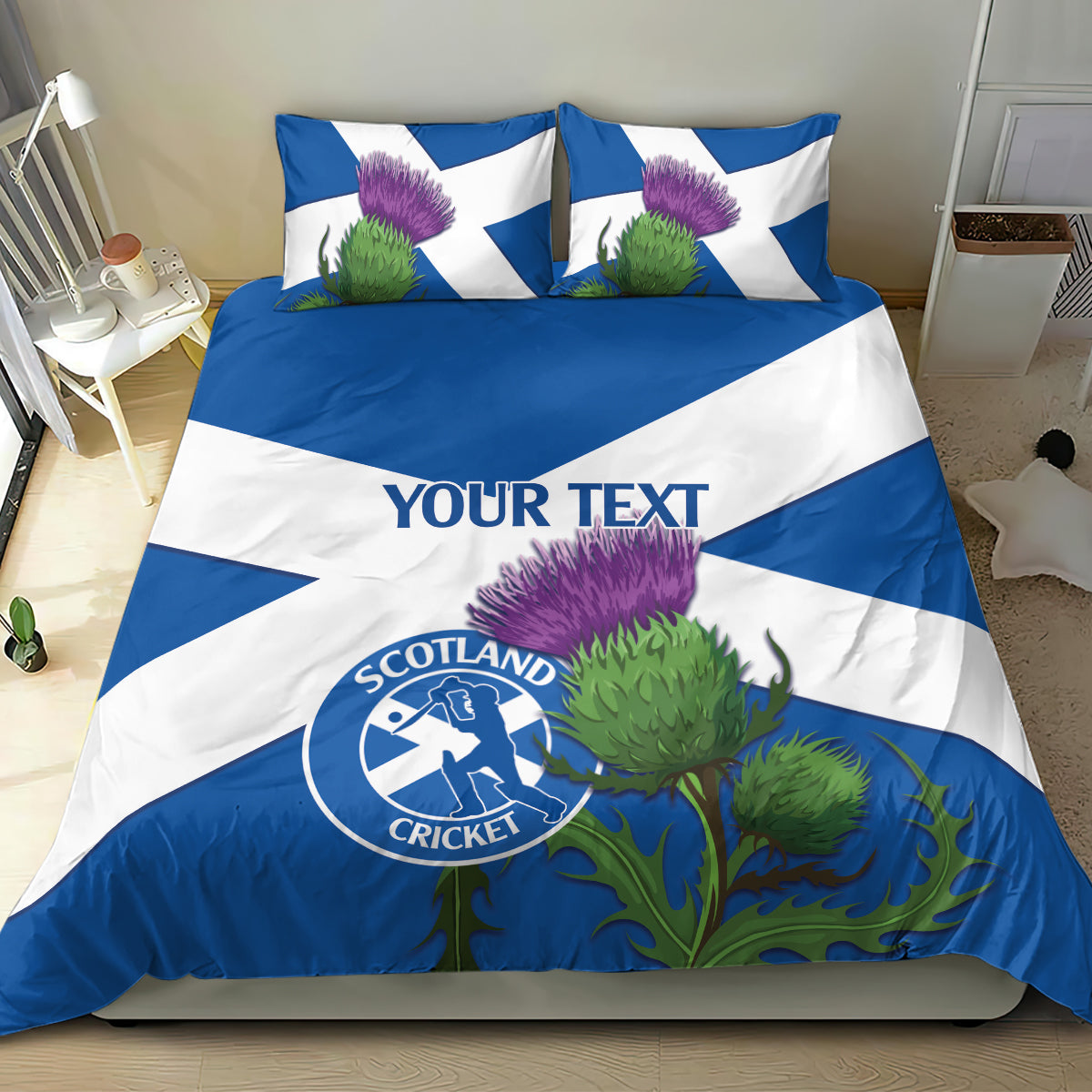 Blue and white duvet and pillow set with custom text, thistles, and Scotland Cricket logo