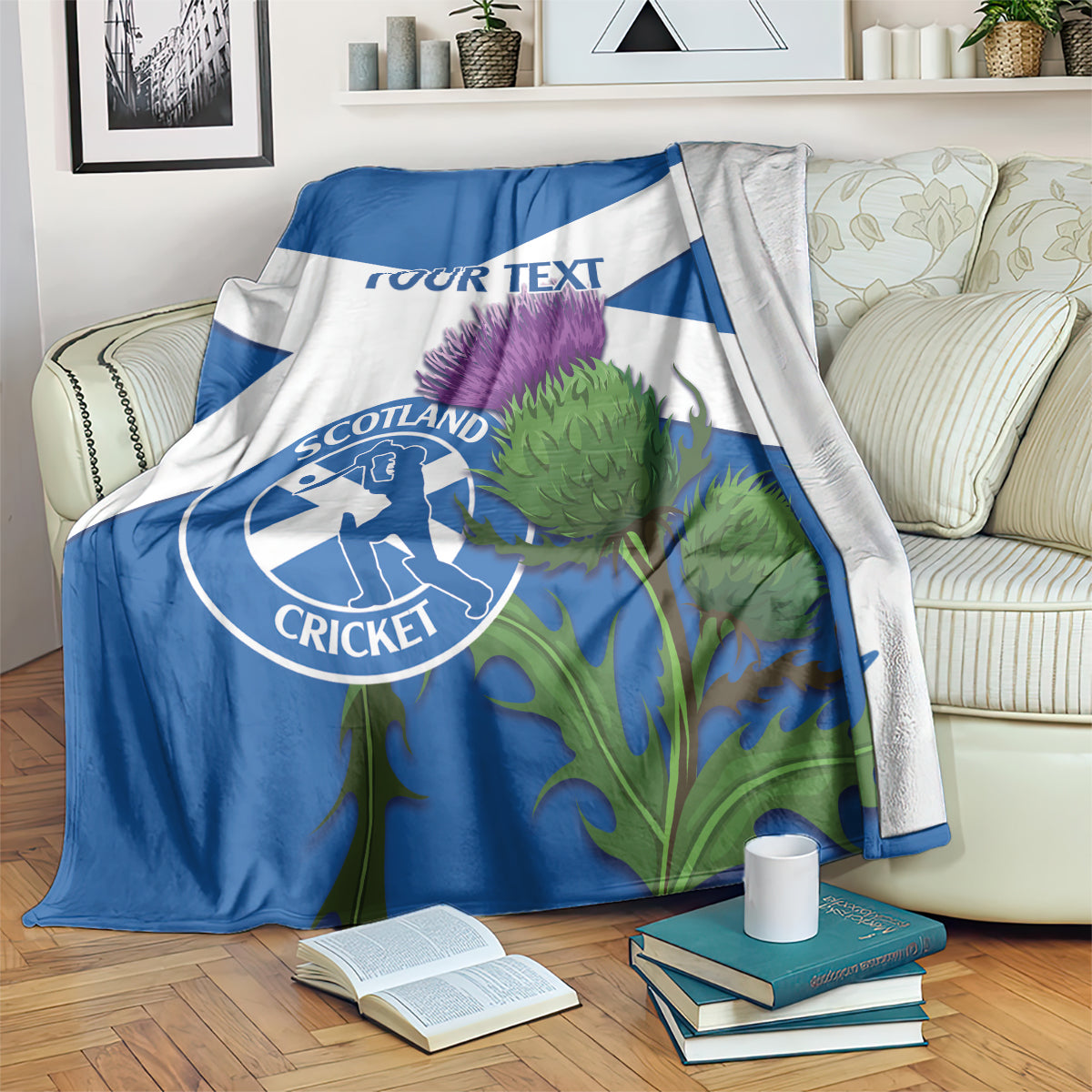 Blue and white Scotland cricket blanket draped with thistle artwork and 'YOUR TEXT'